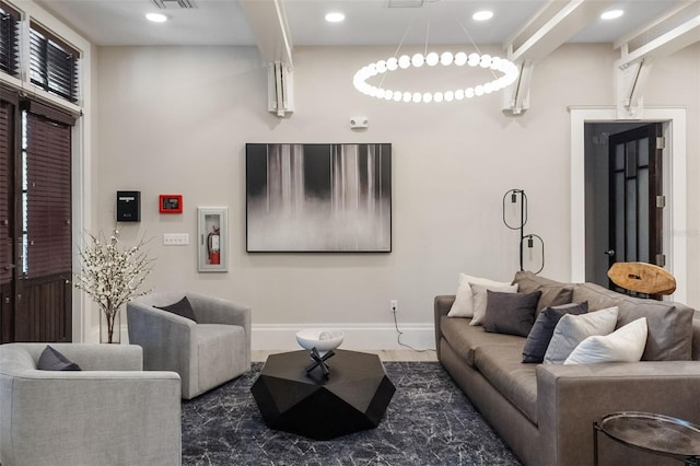 living room with hardwood / wood-style flooring and beamed ceiling