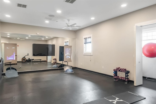 workout area with ceiling fan