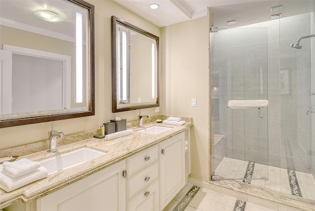 bathroom with tile patterned floors, walk in shower, ornamental molding, and vanity