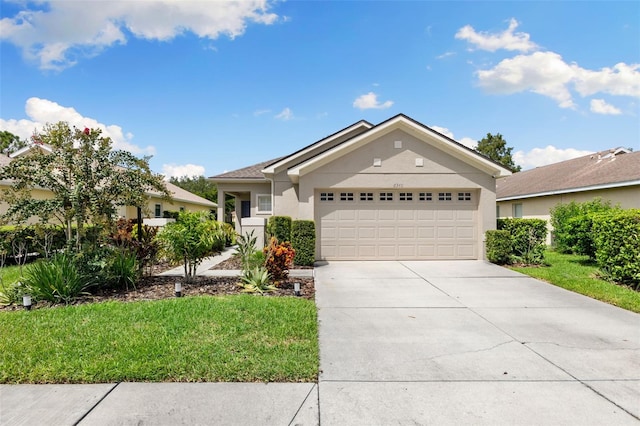 ranch-style house featuring a garage