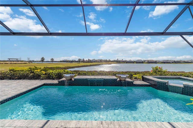 view of swimming pool featuring an in ground hot tub, a patio, a water view, and a lanai