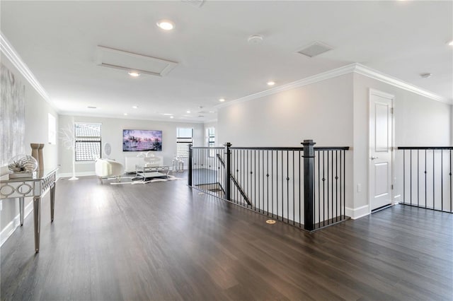 hall with dark hardwood / wood-style flooring and ornamental molding