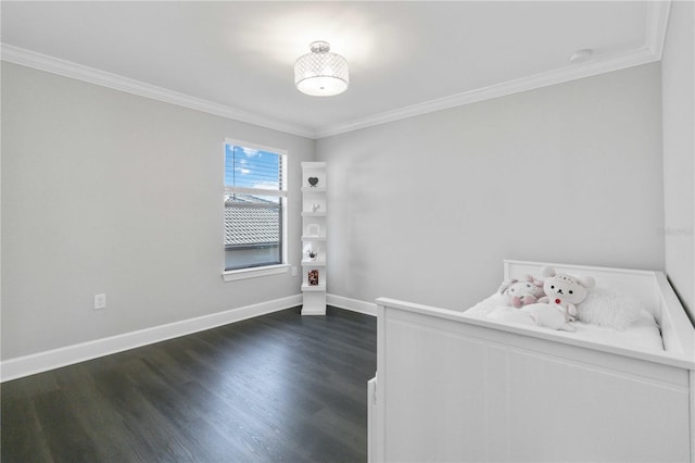 unfurnished bedroom featuring dark hardwood / wood-style floors and ornamental molding