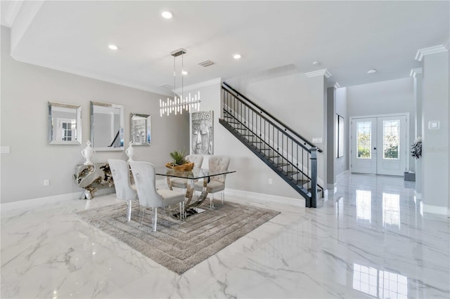 dining space featuring crown molding and french doors