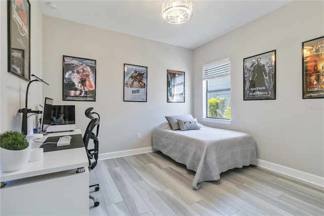 bedroom with light hardwood / wood-style flooring