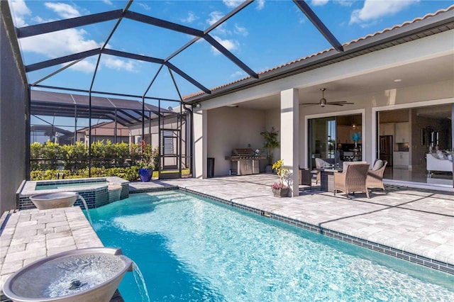 view of pool featuring an in ground hot tub, area for grilling, ceiling fan, grilling area, and a patio area