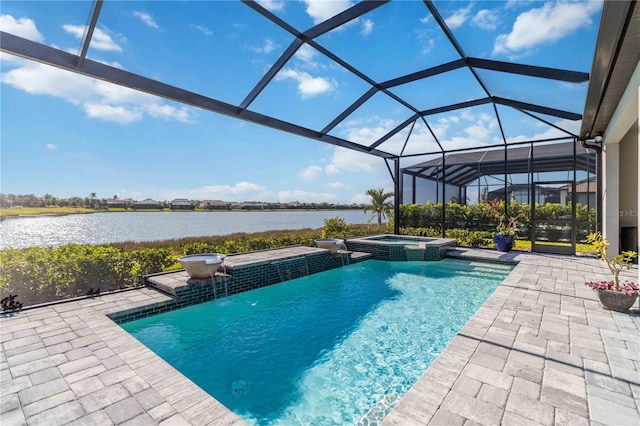 view of swimming pool with glass enclosure, a water view, pool water feature, an in ground hot tub, and a patio area