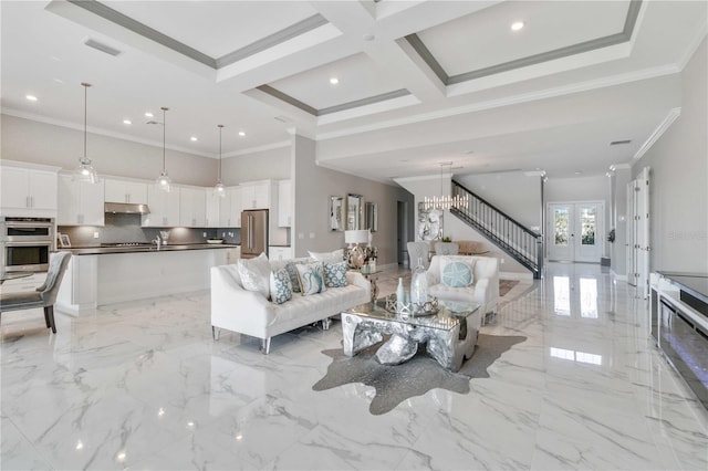 living room with coffered ceiling, crown molding, sink, beamed ceiling, and a chandelier