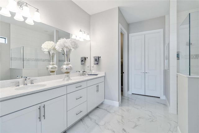 bathroom featuring a shower and vanity