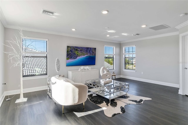 sitting room featuring crown molding, plenty of natural light, and dark wood-type flooring