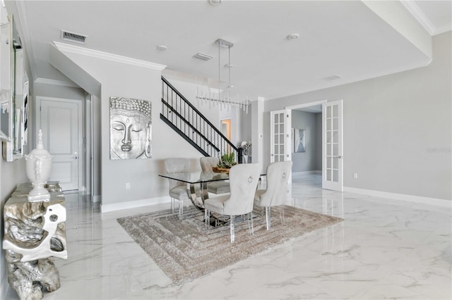 dining area featuring crown molding, french doors, and a notable chandelier