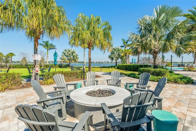 view of patio / terrace with an outdoor fire pit