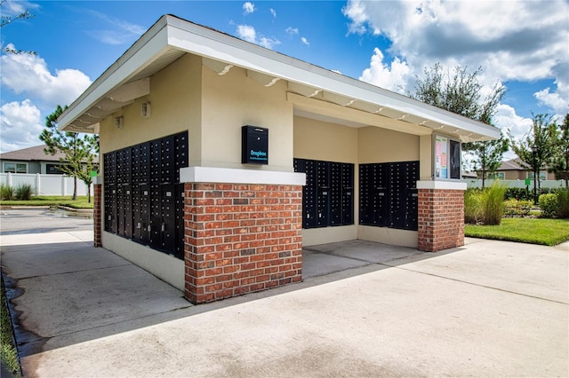 view of community with mail boxes