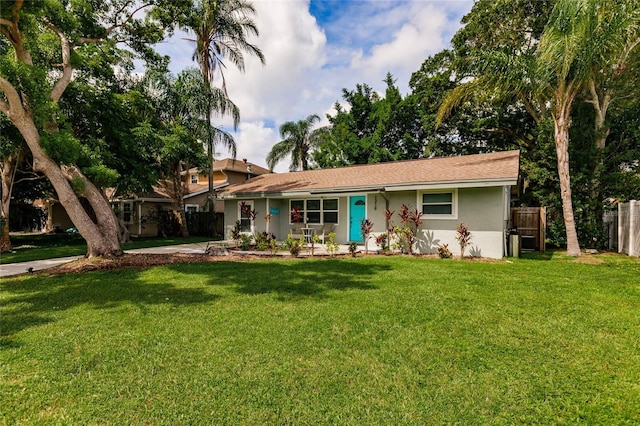 single story home with a front yard