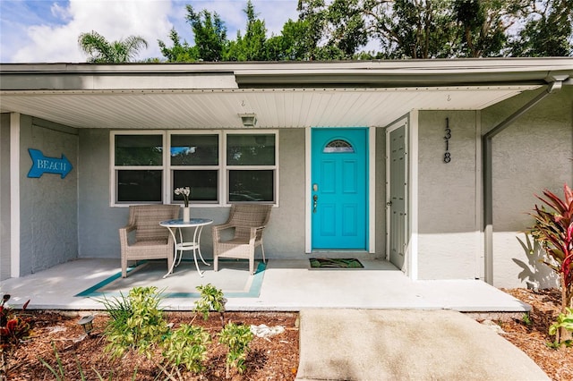 property entrance with a porch