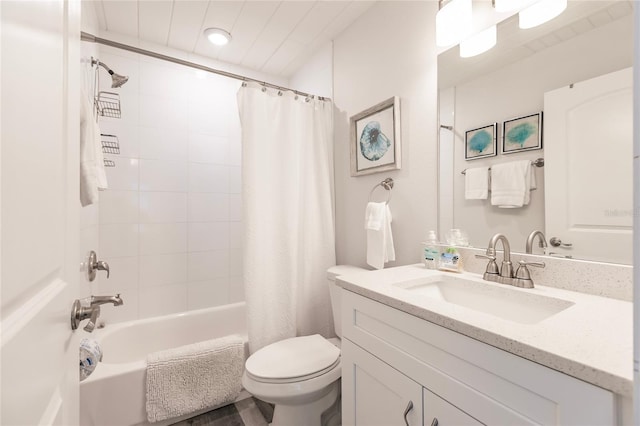 full bathroom featuring toilet, shower / tub combo, and vanity