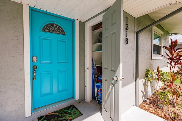 entrance to property with a porch