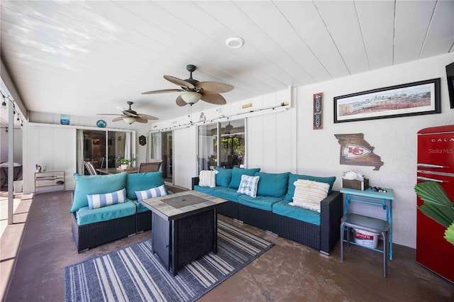 living room featuring ceiling fan