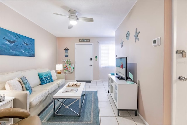 living room featuring ceiling fan and light tile patterned floors