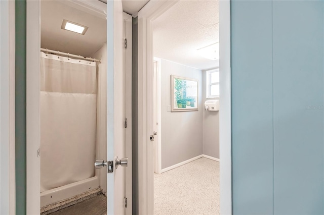 bathroom featuring a shower with curtain