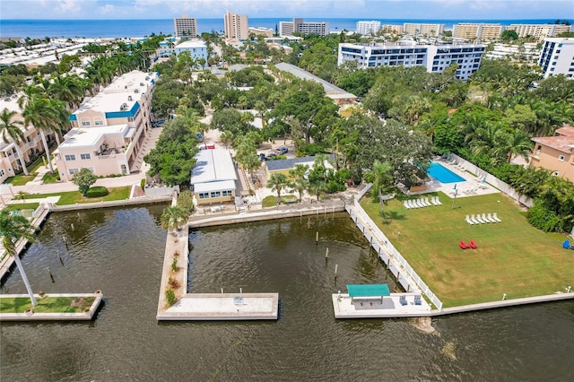 birds eye view of property featuring a water view