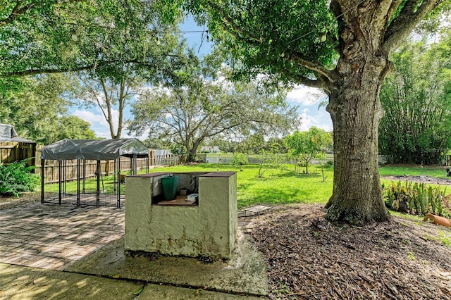 view of home's community with a lawn