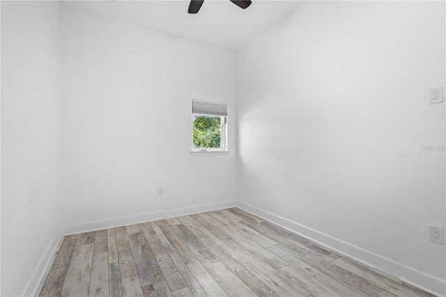 spare room with ceiling fan and light hardwood / wood-style flooring