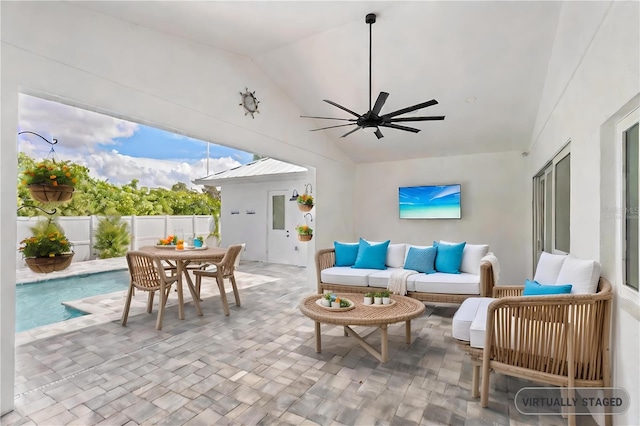 view of patio with a fenced in pool, outdoor lounge area, and ceiling fan