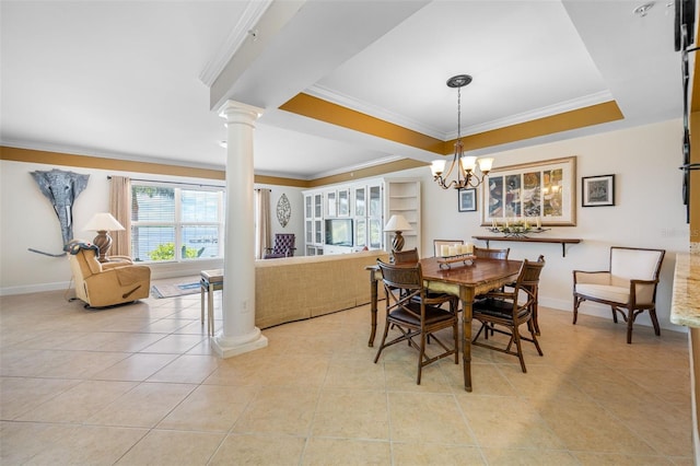 dining area with ornamental molding, a chandelier, light tile patterned floors, and decorative columns