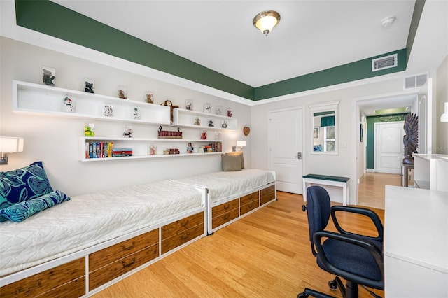 bedroom featuring light wood-type flooring