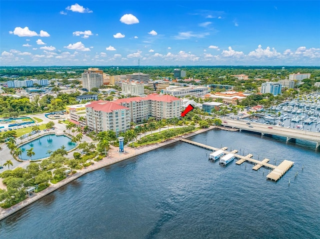 birds eye view of property featuring a water view