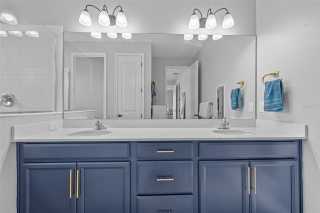 bathroom with vanity and walk in shower