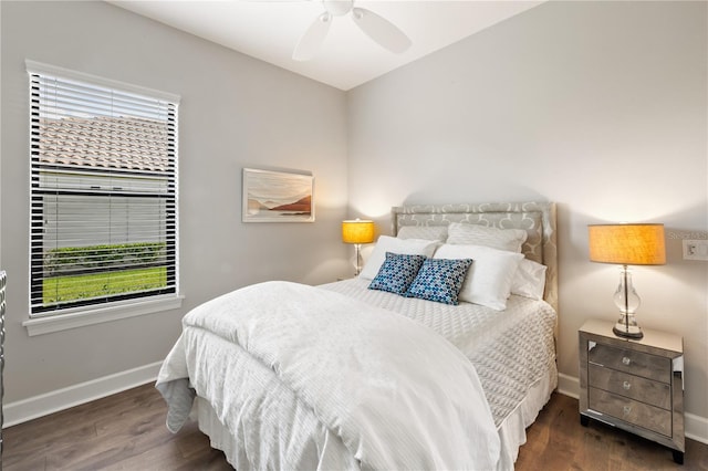 bedroom featuring dark wood-type flooring and ceiling fan