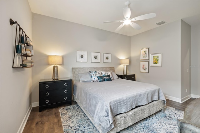 bedroom featuring dark wood-type flooring and ceiling fan