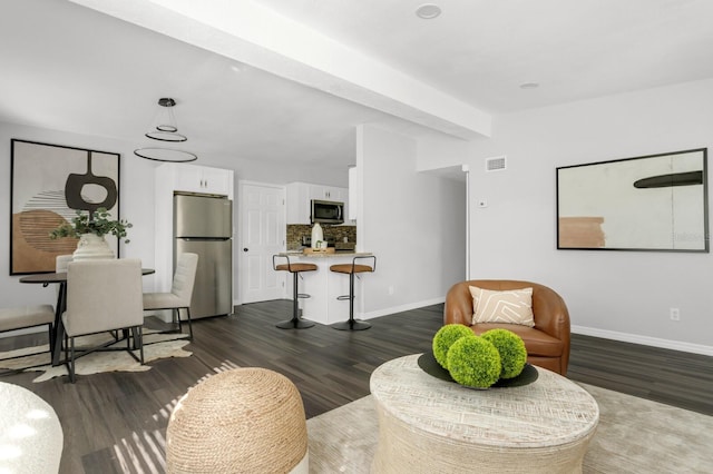 living room featuring dark wood-type flooring