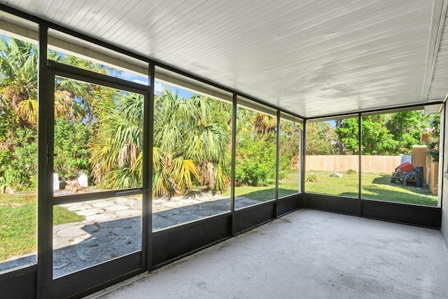 unfurnished sunroom with plenty of natural light