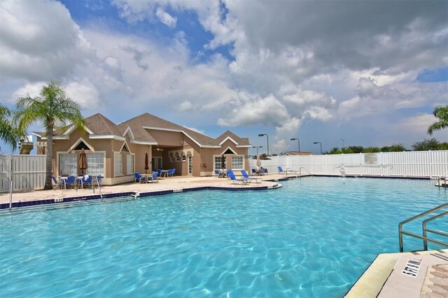 view of swimming pool with a patio area