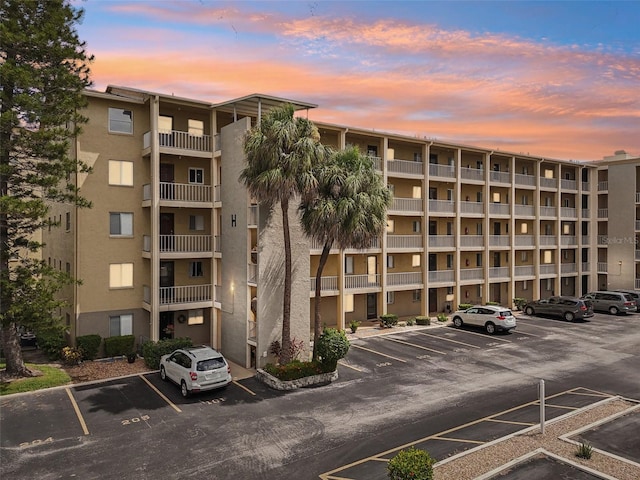 view of outdoor building at dusk