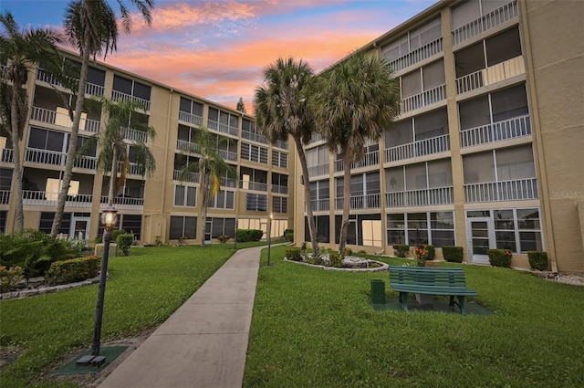 view of outdoor building at dusk