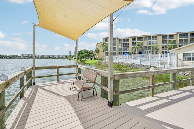 view of dock with a water view