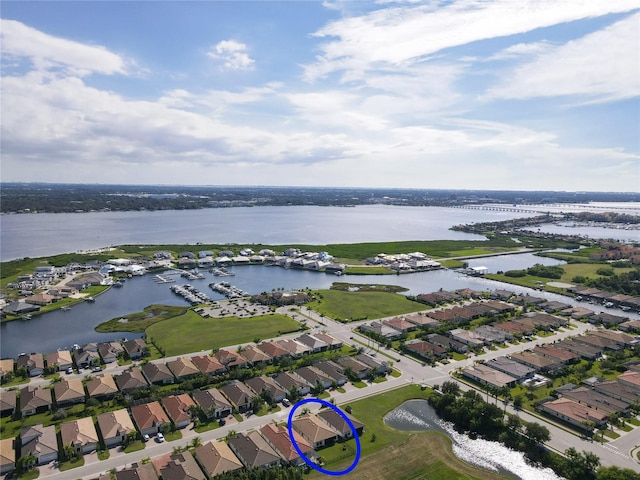 drone / aerial view with a water view