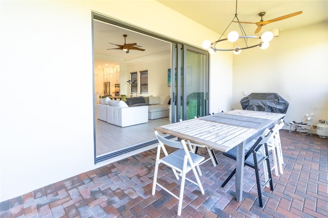 view of patio featuring ceiling fan