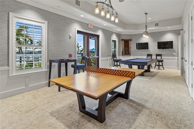 carpeted dining room with billiards and crown molding