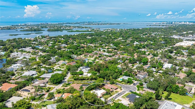 drone / aerial view with a water view