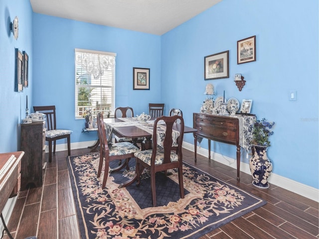 dining room with dark hardwood / wood-style floors