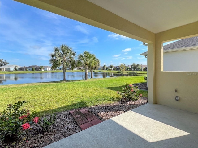 view of yard with a water view