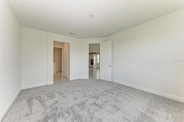 4254 Golden Creek Ter, Parrish, FL 34219 - unfurnished bedroom with light carpet and baseboards