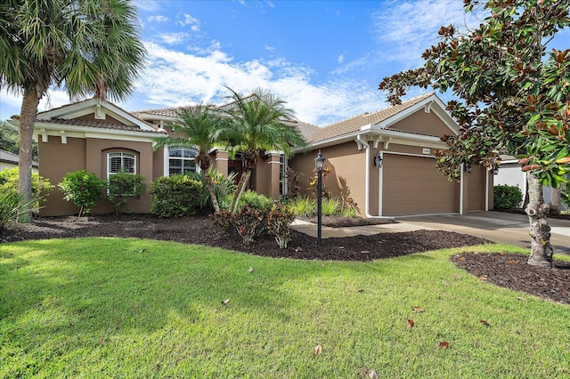 view of front facade featuring a garage and a front lawn