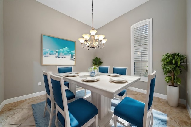 dining room with light tile patterned floors and a notable chandelier