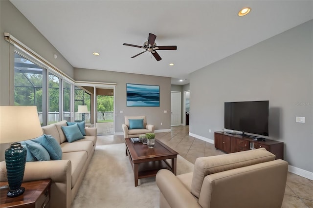 tiled living room featuring ceiling fan